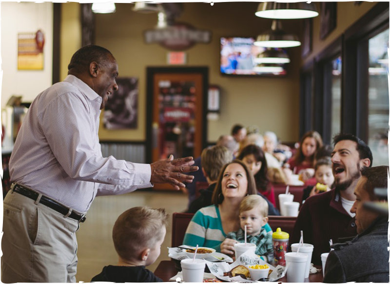 Billy Sims talking with Customer In-Store